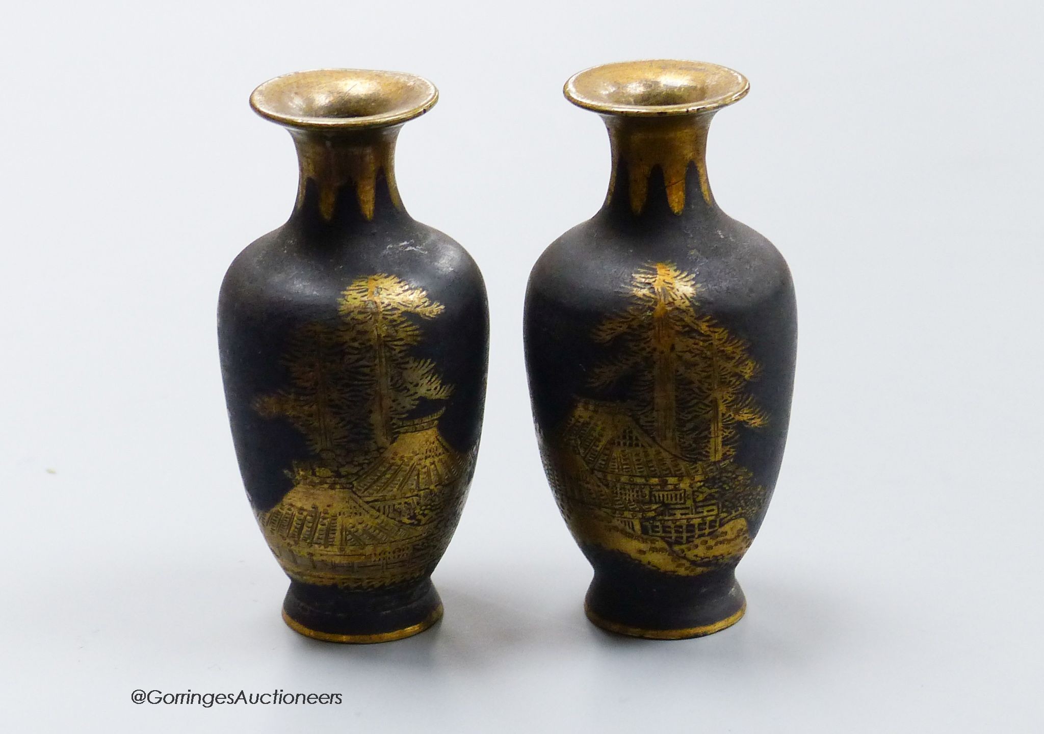 A pair of Japanese Komai style damascened iron miniature vases, height 6cm